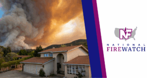 Fire burning behind a house