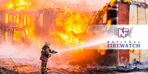 Firefighter battles construction fire